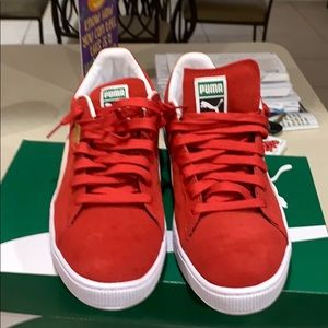 One pair of puma suede sneakers
